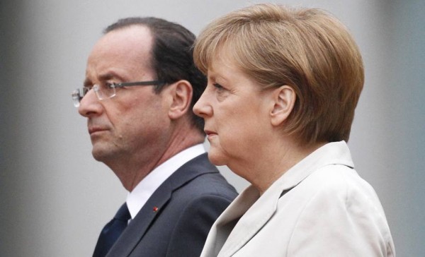 Меркель и Оланд предложат свой механизм распределения беженцев по странам ЕС