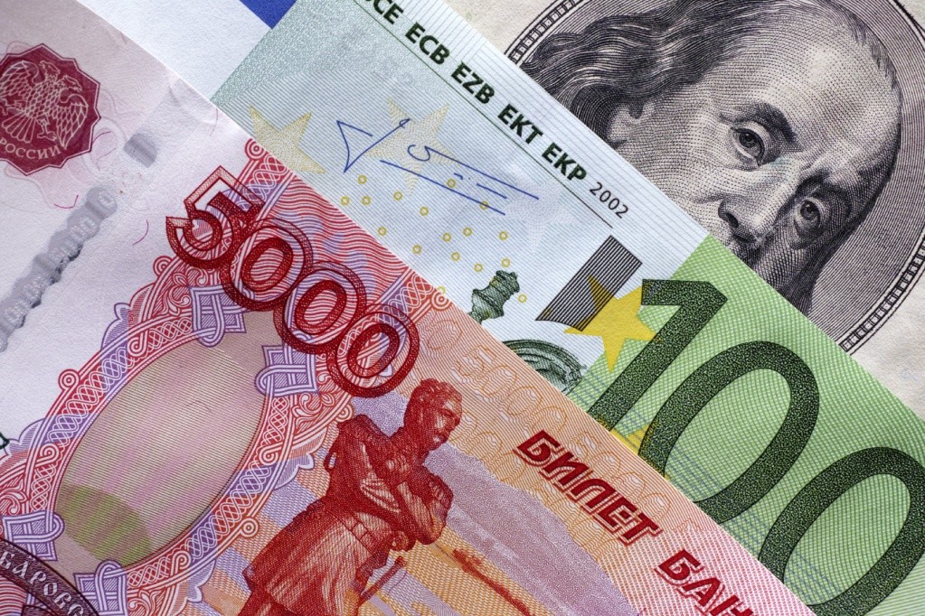 Доллар вырос до 59,13 рубля